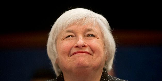Federal Reserve Chair Janet Yellen smiles prior to testifying on Capitol Hill in Washington, Wednesday, Feb. 25, 2015, before the House Financial Services Committee hearing: