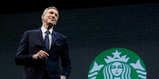 Starbucks CEO Howard Schultz speaks Wednesday, March 18, 2015 at the coffee company's annual shareholders meeting in Seattle. Schultz defended the company's new