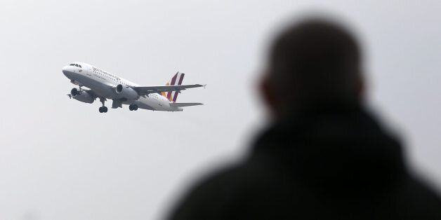 A Germanwings plane takes off at the airport in Duesseldorf, Wednesday March 25, 2015. the day after a Germanwings aircraft crashed in France on the way from Barcelona, Spain,  to Duesseldorf, Germany, killing 150 people.   (AP Photo Frank Augstein)