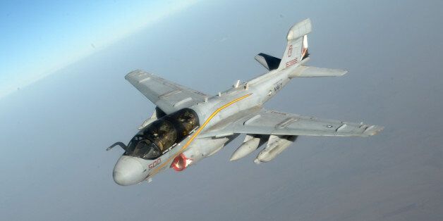In this Saturday, Oct. 4, 2014 photo released by the U.S. AirForce, a U.S. Navy EA-6B Prowler supporting operations against the militant Islamic State group leaves after being refueled by a KC-135 Statotanker over Iraq, Oct. 4, 2014. (AP Photo/U.S. Air Force, Shawn Nickel)