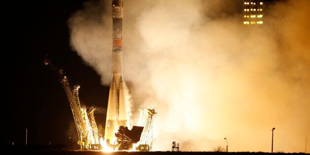The Soyuz-FG rocket booster with Soyuz TMA-16M space ship carrying a new crew to the International Space Station, ISS, blasts off at the Russian leased Baikonur cosmodrome, Kazakhstan, Saturday, March 28, 2015. The Russian rocket carries U.S. astronaut Scott Kelly, Russian cosmonauts Gennady Padalka, and Mikhail Korniyenko,. (AP Photo/Dmitry Lovetsky)