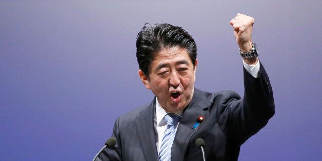 Japan's Prime Minister Shinzo Abe delivers a speech during the Liberal Democratic Party's annual convention at a hotel in Tokyo, Sunday, March 8, 2015. (AP Photo/Shizuo Kambayashi)