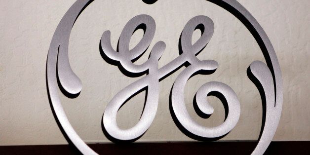 FILE-  This Dec. 2, 2008, file photo, shows a General Electric (GE) logo on display at Western Appliance store in Mountain View, Calif. (AP Photo/Paul Sakuma, File)