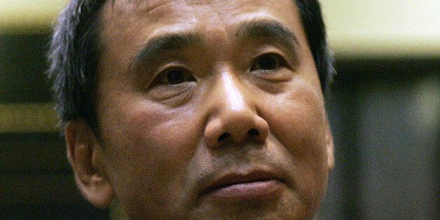 Novelist Haruki Murakami of Japan looks on during the ceremony for the Franz Kafka International Literary award hosted at the Prague's Old Town Hall, Czech Republic, Monday, Oct. 30, 2006.   Murakami was chosen in March by an international jury which includes prominent German literary critic Marcel Reich-Ranicki and British publisher John Calder to win the annual Franz Kafka Prize, the Franz Kafka Society said. (AP Photo/Petr David Josek)