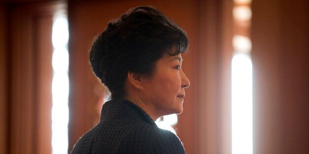South Korea's President Park Geun-hye waits for the arrival of Prime Minister of the Czech Republic Bohuslav Sobotka at the presidential Blue House Thursday, Feb. 26, 2015. (AP Photo/Ed Jones, Pool)