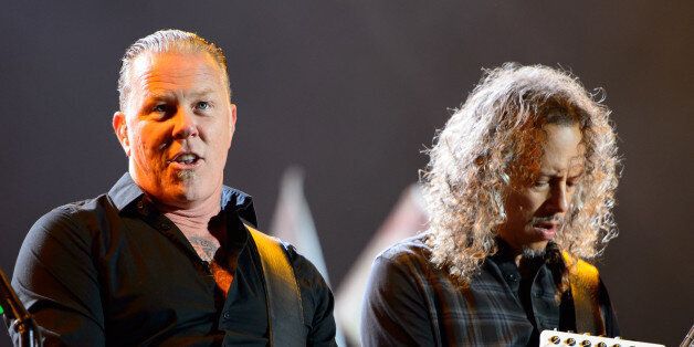 James Hetfield, left and Kirk Hammett, right from U.S band Metallica performs at Glastonbury music festival, England, Saturday, June 28, 2014. Thousands of music fans have arrived for the festival to see headliners Arcade Fire, Metallica and Kasabian. (Photo by Jonathan Short/Invision/AP)