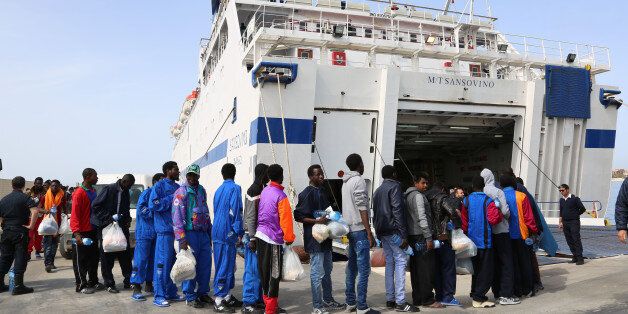 Migrants board on a ferry as they leave the Island of Lampedusa, Southern Italy, to be transferred in Porto Empedocle, Sicily, Friday, April 17, 2015.  An unprecedented wave of migrants has headed for the European Union's promised shores over the past week, with 10,000 people making the trip. Hundreds â nobody knows how many â have disappeared into the warming waters of the Mediterranean, including 41 migrants reported dead Thursday after a shipwreck. (AP Photo/Francesco Malavolta)