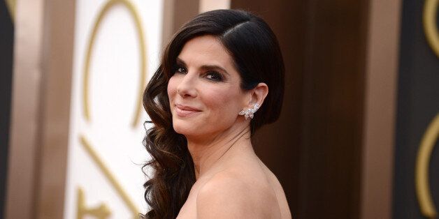 FILE - In this March 2, 2014, file photo, Sandra Bullock arrives at the Oscars at the Dolby Theatre, in Los Angeles. People magazine has named Bullock as the