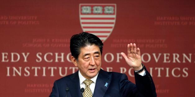 Japanese Prime Minister Shinzo Abe speaks at the John F. Kennedy School of Government forum in Cambridge, Mass., Monday, April 27, 2015. (AP Photo/Michael Dwyer)