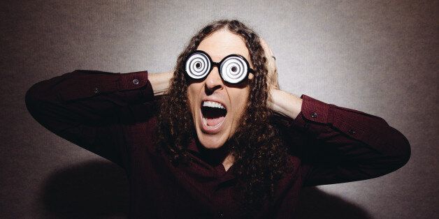 In this July 17, 2014 photo, âWeird Alâ Yankovic poses for a portrait in Los Angeles. Billboard reported that Yankovic's âMandatory Funâ debuted at No. 1 this week with more than 80,000 units sold. Thatâs almost double the amount his last album,