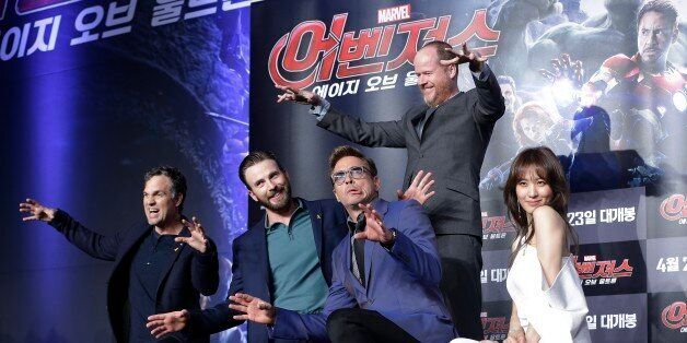 From left, U.S. actors Mark Ruffalo, Chris Evans, Robert Downey Jr., U.S. director Joss Whedon and South Korean actress Claudia Kim pose during a press conference to promote their latest film