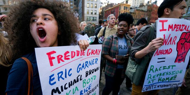 Protesters yell out in Union Square Wednesday, April 29, 2015, in New York. People gathered to protest the death of Freddie Gray, a Baltimore man who was critically injured in police custody. (AP Photo/Craig Ruttle)