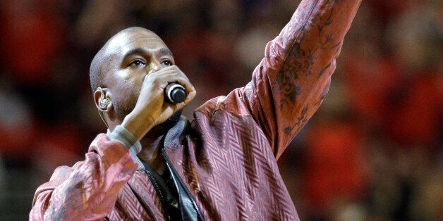 Rapper Kanye West performs during Game 4 in a second-round NBA basketball playoff series between the Cleveland Cavaliers and the Chicago Bulls in Chicago on Sunday, May 10, 2015. (AP Photo/Nam Y. Huh)