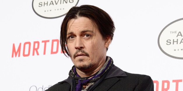Actor Johnny Depp attends the premiere of the feature film