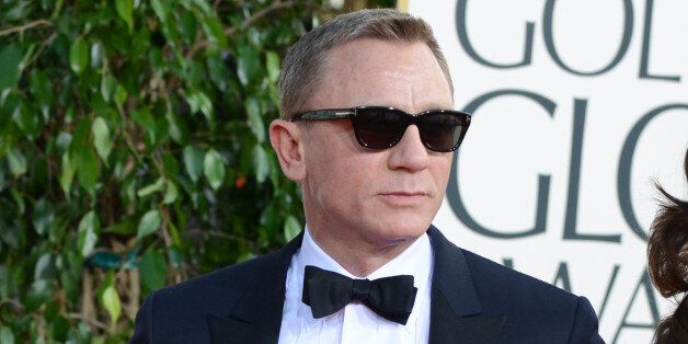 Daniel Craig and Rachel Weisz arrive at the 70th Annual Golden Globe Awards at the Beverly Hilton Hotel on Sunday Jan. 13, 2013, in Beverly Hills, Calif. (Photo by Jordan Strauss/Invision/AP)