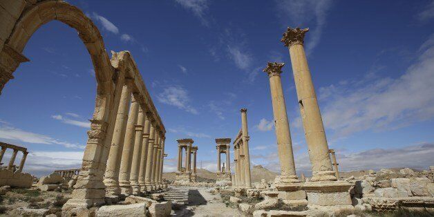 A picture taken on March 14, 2014 shows a partial view of the ancient oasis city of Palmyra, 215 kilometres northeast of Damascus. From the 1st to the 2nd century, the art and architecture of Palmyra, standing at the crossroads of several civilizations, married Graeco-Roman techniques with local traditions and Persian influences. AFP PHOTO/JOSEPH EID        (Photo credit should read JOSEPH EID/AFP/Getty Images)