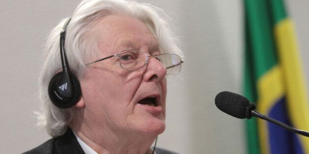 British author Andrew Jennings talks about corruption allegations involving FIFA and the Brazilian Football Confederation (CBF) during a meeting by Brazil's federal senate sports commission in Brasilia, Brazil, Wednesday Oct. 26, 2011. (AP Photo/Eraldo Peres)