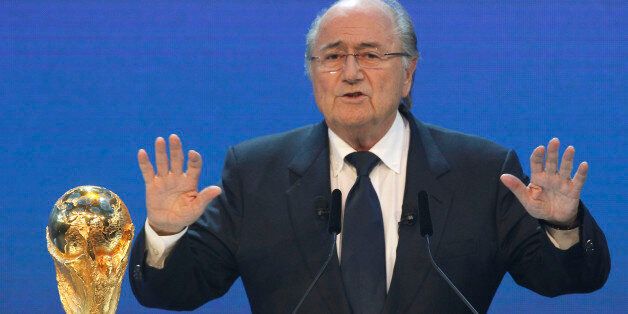 FIFA President Joseph Blatter gestures before announcing Russia as the host country for the 2018 soccer World Cup in Zurich, Switzerland, Thursday, Dec. 2, 2010. (AP Photo/Anja Niedringhaus)