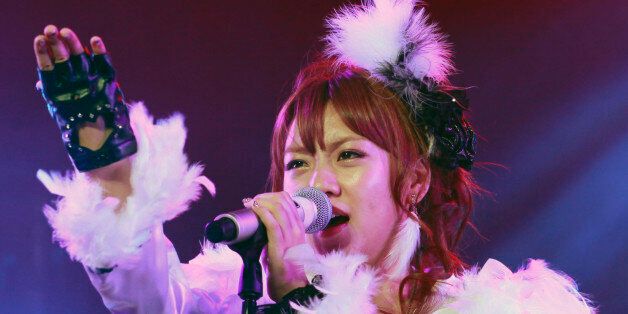 Member of Japanese idol group AKB48 Minami Takahashi performs during their live concert in Jakarta, Indonesia, Saturday, Feb. 25, 2012. (AP Photo/Dita Alangkara)