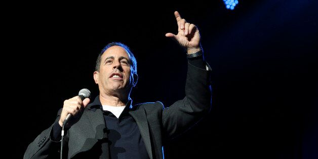 Comedian Jerry Seinfeld performs at the Stand Up for Heroes event at Madison Square Garden, Wednesday, Nov. 6, 2013, in New York. (John Minchillo/Invision/AP)