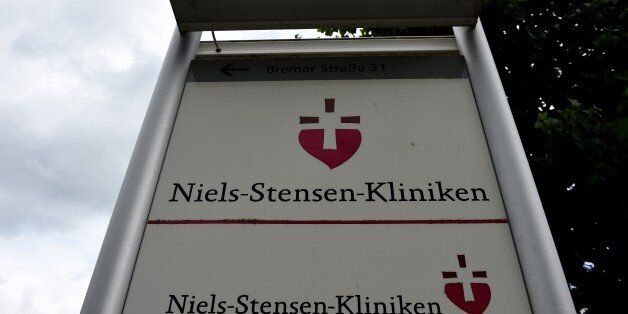 A sign of the St Raphael Hospital, where a 65-year-old man died after contracting the MERS virus, is pictured in Ostercappeln, Germany on June 16, 2015. The 65-year-old German man died this month after contracting MERS during a trip to Abu Dhabi, in the first death linked to the virus in Europe this year, authorities said Tuesday.The man died in the western town of Ostercappeln on June 6 of an acute lung ailment that came as a complication from the MERS virus, the health ministry of Lower Saxony