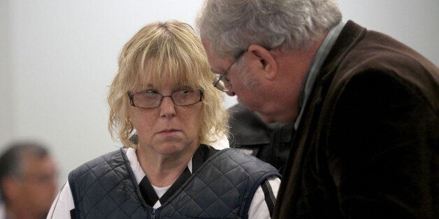 Joyce Mitchell stands with her lawyer Steven Johnston, appearing before Judge Buck Rogers in Plattsburgh City Court, New York, for a hearing Monday, June 15, 2015. She is charged with helping Richard Matt and David Sweat escape from the Clinton Correctional Facility near the Canadian border on June 6. Mitchell, 51, was charged Friday with supplying hacksaw blades, chisels, a punch and a screwdriver. Her lawyer entered a not guilty plea on her behalf.  (G.N. Miller/NY Post via AP, Pool)
