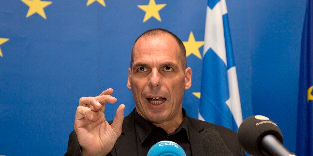 Greek Finance Minister Yanis Varoufakis speaks during a media conference after a meeting of eurogroup finance ministers at the European Council building in Luxembourg on Thursday, June 18, 2015. Greece faced intense pressure Thursday from its international creditors to break a deadlock in bailout discussions thatâs raised the specter of the countryâs imminent bankruptcy and even its exit from the euro. (AP Photo/Virginia Mayo)