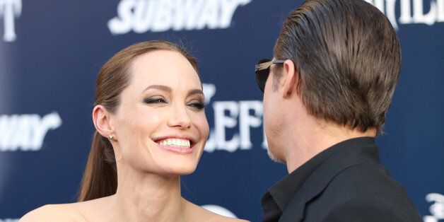 Angelina Jolie and Brad Pitt arrive at the world premiere of