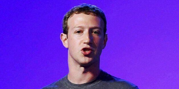 Facebook CEO Mark Zuckerberg addresses the internet.org summit in New Delhi, India, Thursday, Oct.9, 2014. (AP Photo/Press Trust of India) INDIA OUT