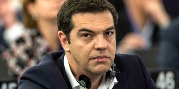 Greek Prime Minister Alexis Tsipras is pictured at the European Parliament in Strasbourg, eastern France, Wednesday, July 8, 2015.  Tsipras earned both cheers and jeers as he addressed lawmakers at the European Parliament, where he said his country is seeking a deal that might bring a definitive end to his country's financial crisis, not just a temporary stop-gap.(AP Photo/Jean-Francois Badias)