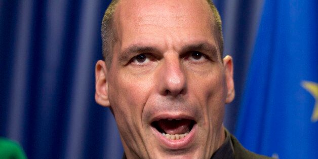 Greek Finance Minister Yanis Varoufakis listens to questions during a media conference after a meeting of eurogroup finance ministers in Brussels on Saturday, June 27, 2015. Anxiety over Greece's future swelled on Saturday after Prime Minister Alexis Tsipras' call to have the people vote on a proposed bailout deal. (AP Photo/Virginia Mayo)