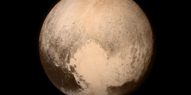 This July 13, 2015 image provided by NASA shows Pluto from the New Horizons spacecraft.  The United States is now the only nation to visit every single planet in the solar system. Pluto was No. 9 in the lineup when New Horizons departed Cape Canaveral, Fla, on Jan. 19, 2006  (NASA via AP)