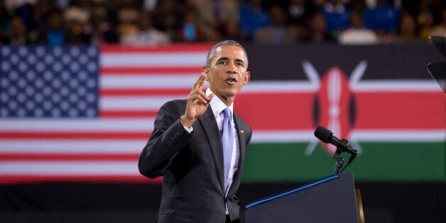 President Barack Obama delivers a speech, in front of American and Kenyan flags, at the Safaricom Indoor Arena in the Kasarani area of Nairobi, Kenya Sunday, July 26, 2015. Obama is traveling on a two-nation African tour where he will become the first sitting U.S. president to visit Kenya and Ethiopia. (AP Photo/Ben Curtis)