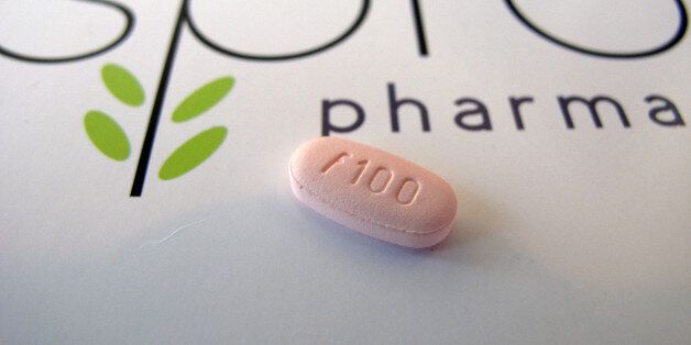 FILE - In this June 22, 2015, photo, a tablet of flibanserin sits on a brochure for Sprout Pharmaceuticals in the company's Raleigh, N.C., headquarters. The Food and Drug Administration on Tuesday, Aug. 18, 2015, approved the first prescription drug designed to boost sexual desire in women, a milestone long sought by a pharmaceutical industry eager to replicate the blockbuster success of impotence drugs for men. (AP Photo/Allen G. Breed)