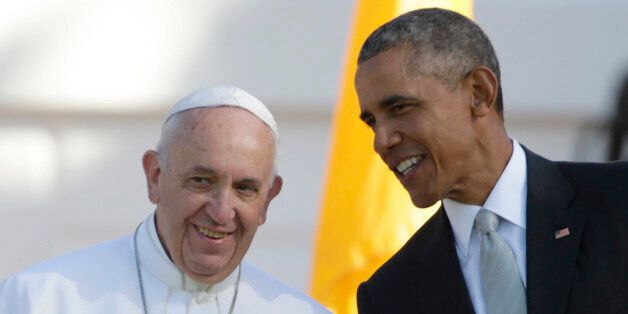 President Barack Obama leans over to talk to Pope Francis during a state arrival ceremony on the South Lawn of the White House in Washington, Wednesday, Sept. 23, 2015. (AP Photo/Pablo Martinez Monsivais)