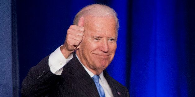 In this Sept. 22, 2015, photo, Vice President Joe Biden gives a 'thumbs-up' after speaking at the White House Initiative on Historically Black Colleges and Universities' (HBCU) National HBCU Week annual conference in Washington. The Human Rights Campaign says Biden will be the keynote speaker for its annual dinner. The national gay rights group is hosting the dinner Oct. 3 in Washington. The speech is a major opportunity for Biden to demonstrate his support among LGBT voters. Biden is considerin