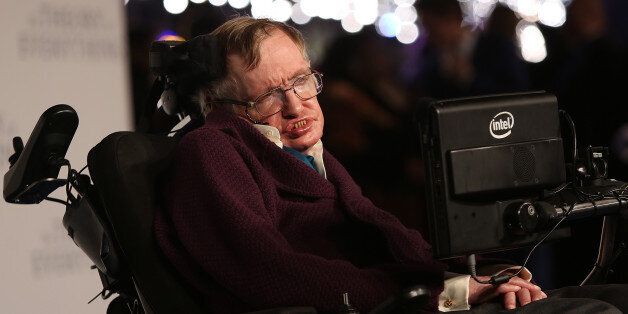 Professor Stephen Hawking arrives on the blue carpet for the UK premiere of The Theory Of Everything at the Odeon in Leicester Square, central London, Tuesday, Dec. 9, 2014. (Photo by Joel Ryan/Invision/AP)