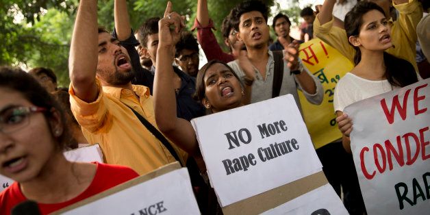 Indian youth shout slogans during a protest against the latest incidents of rape in New Delhi, India, Sunday, Oct. 18, 2015. Police arrested two teenagers Sunday for allegedly raping a toddler in New Delhi, in the latest incident of sexual violence against a young child in the Indian capital. In a separate incident, police on Saturday arrested three men for raping a 5-year-old in an east Delhi suburb.(AP Photo /Tsering Topgyal)