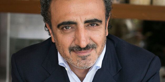 IMAGE DISTRIBUTED FOR CHOBANI, LLC - In this image released on Thursday, May 28, 2015, Chobani's founder and CEO Hamdi Ulukaya at the Chobani Soho cafÃ© in New York. (Mark Von Holden/AP Images for Chobani, LLC)