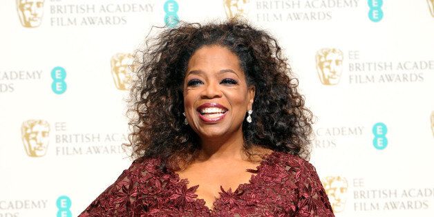 Oprah Winfrey poses for photographers in the winners room at the EE British Academy Film Awards held at the Royal Opera House on Sunday Feb. 16, 2014, in London. (photos by Jon Furniss/Invision/AP)