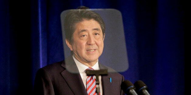 Japan Prime Minister Shinzo Abe speaks during a news conference, Tuesday, Sept. 29, 2015, in New York. (AP Photo/Julie Jacobson)