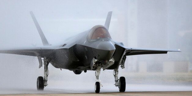 An F-35 arrives at it new operational base Wednesday, Sept. 2, 2015, at Hill Air Force Base, in northern Utah. Two F-35 jets touched down Wednesday afternoon at the base, about 20 miles north of Salt Lake City. A total of 72 of the fighter jets and their pilots will be permanently based in Utah. (AP Photo/Rick Bowmer)