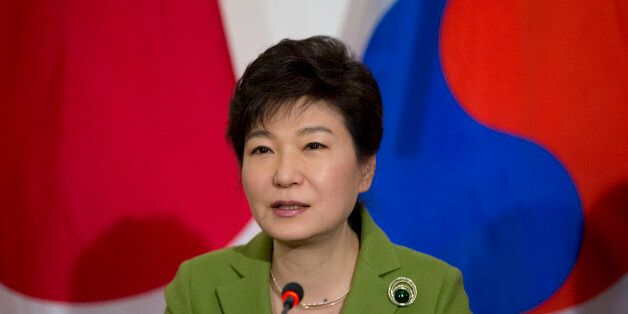 South Korean President Park Geun-hye speaks during a trilateral meeting with President Barack Obama and Japanese Prime Minister Shinzo Abe, Tuesday, March 25, 2014, at the US Ambassador's Residence in the Hague, Netherlands. (AP Photo/Pablo Martinez Monsivais)