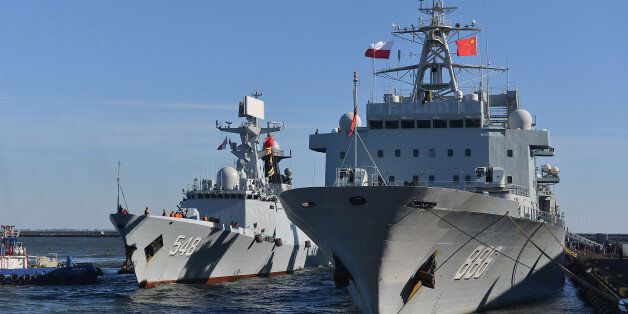 Chinese Navy Yiyang 548 frigate and Qiandaohu 886 supply vessel are moored in the navy port in Gdynia, Poland, Wednesday, Oct. 7, 2015, on the first ever visit by the Chinese navy to this European Union nation. The visit marks 66 years of bilateral ties and is intended to strengthen them even further. They will remain until Sunday and will be open to the public on Saturday. (AP Photo/Andrzej J. Gojke) POLAND OUT