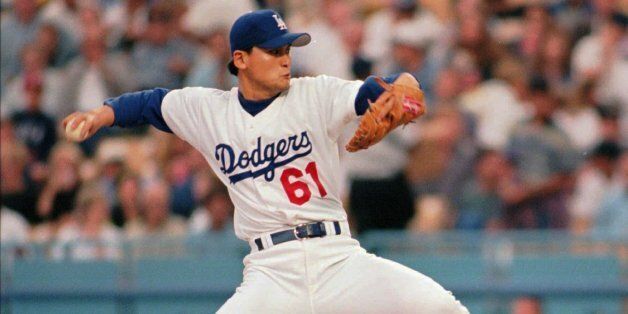 Los Angeles Dodgers pitcher Chan Ho Park throws in the first inning of play against the St. Louis Cardinals Friday, June 6, 1997 in Los Angeles. (AP Photo/Michael Tweed)