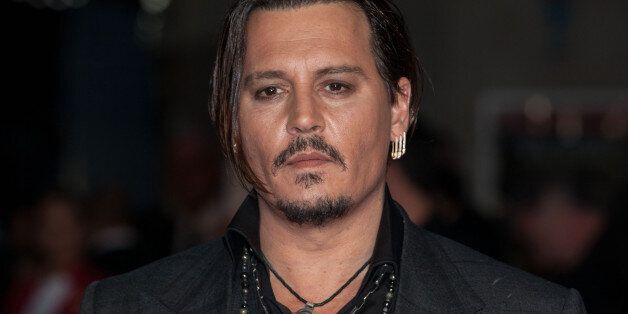 Actor Johnny Depp poses for photographers upon arrival at the Premiere of the film Black Mass, showing as part of the London Film Festival, in central London, Sunday, Oct. 11, 2015. (Photo by Grant Pollard/Invision/AP)