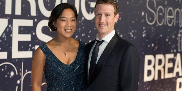 Priscilla Chan and Mark Zuckerberg arrive at the 2nd Annual Breakthrough Prize Award Ceremony at the NASA Ames Research Center on Sunday, Nov. 9, 2014 in Mountain View, California. (Photo by [Peter Barreras]/Invision/AP)