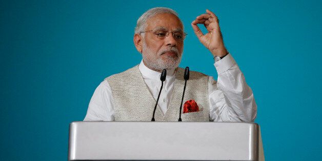 Indian Prime Minister Narendra Modi delivers the 37th Singapore Lecture Monday, Nov. 23, 2015, in Singapore as he starts his two-day official visit to the city-state. (AP Photo/Wong Maye-E)