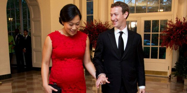 Facebook Chairman and Chief Executive Officer Mark Zuckerberg and his wife Priscilla Chan, arrive for a State Dinner in honor of Chinese President Xi Jinping, in the East Room of the White House in Washington, Friday, Sept. 25, 2015.  (AP Photo/Manuel Balce Ceneta)