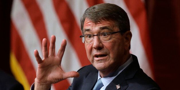 Defense Secretary Ash Carter responds to a question during a forum at the John F. Kennedy School of Government at Harvard University, Tuesday, Dec. 1, 2015, in Cambridge, Mass. Carter told Congress Tuesday that the U.S. is deploying a new special expeditionary force to help Iraqi and Kurdish forces fight Islamic State militants. (AP Photo/Steven Senne)